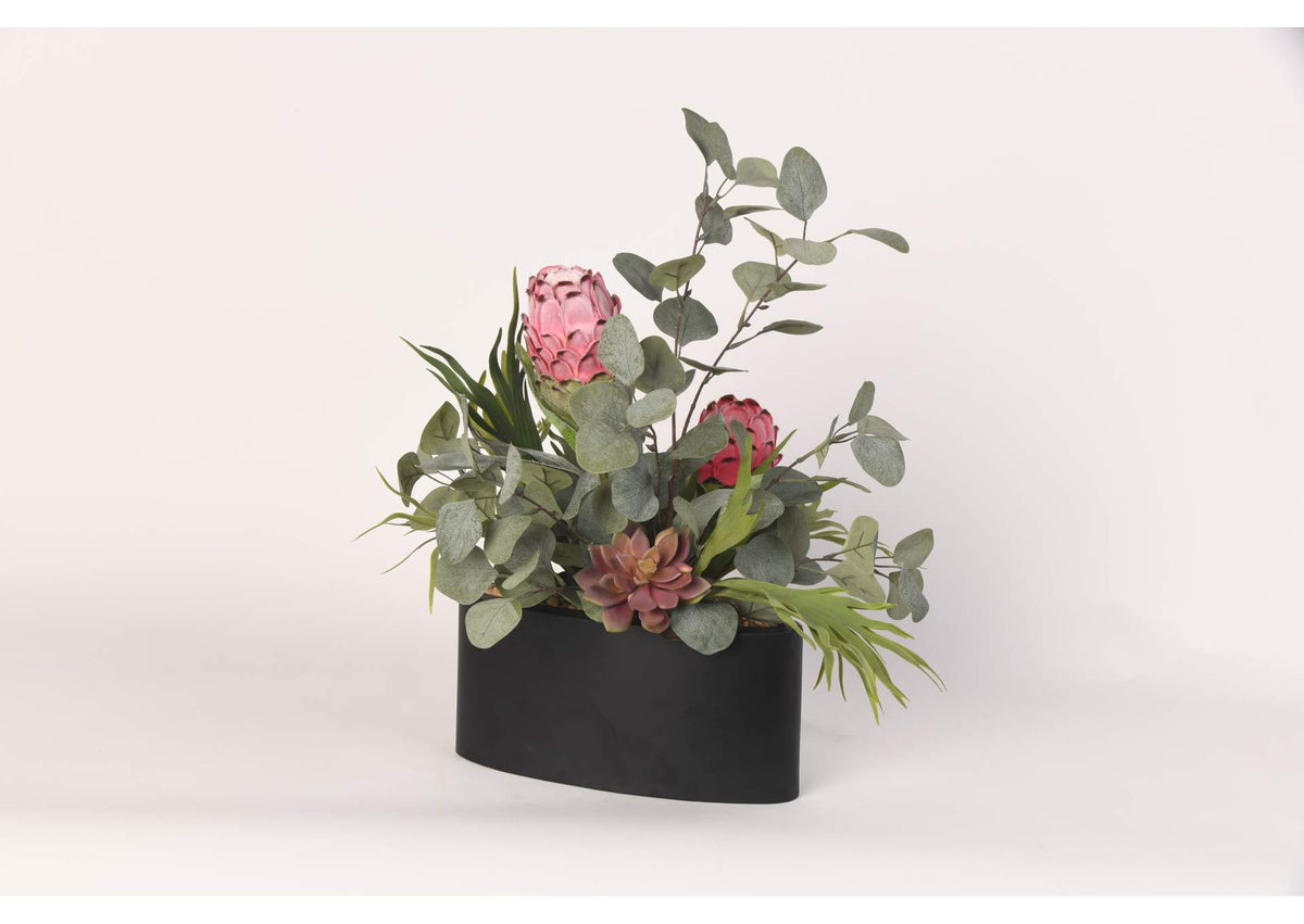 217023 Pink Proteas With Eucalyptus and Echeveria in Oval Metal Planter