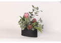 217023 Pink Proteas With Eucalyptus and Echeveria in Oval Metal Planter