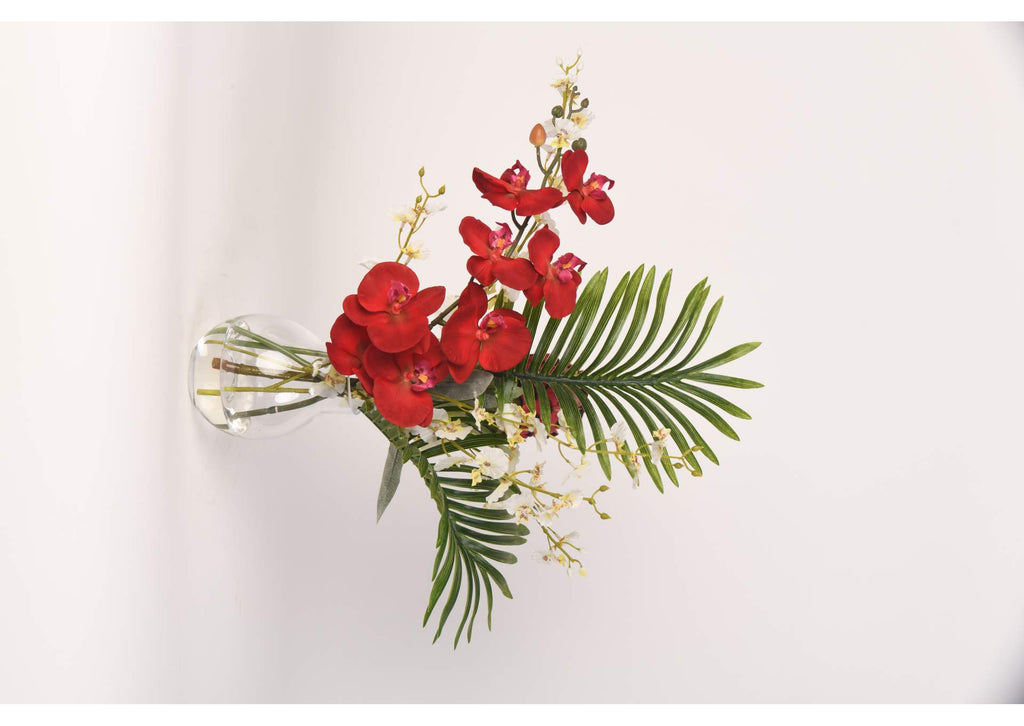217034 Red Orchids With Palm Fronds in Glass Vase