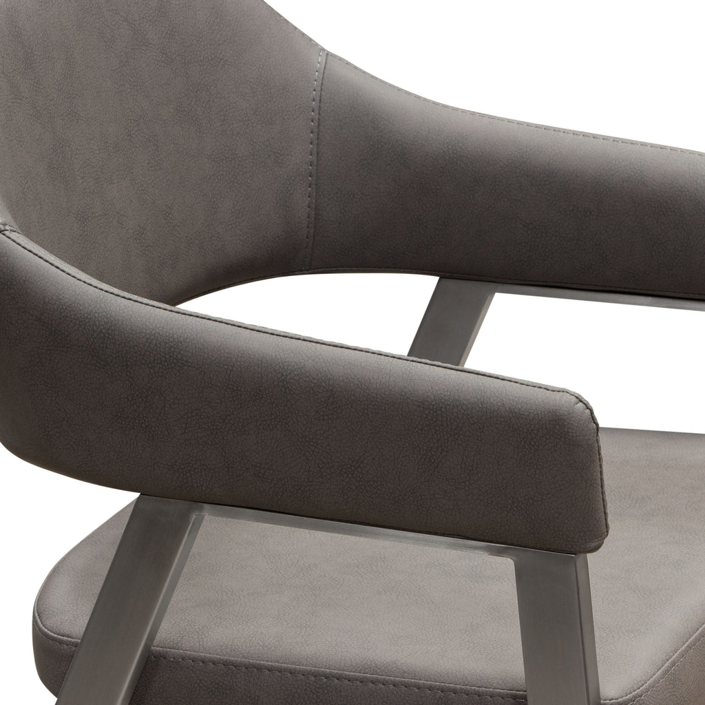 Adele Set of Two Dining/Accent Chairs in Grey Leatherette w/ Brushed Stainless Steel Leg by Diamond Sofa - styled in a staged room by Center Stage Home Design