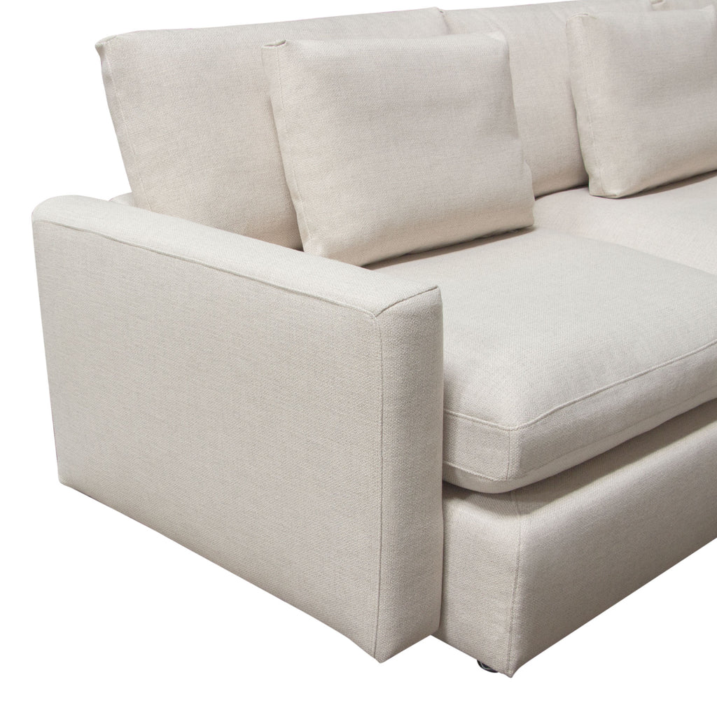 Arcadia 2PC Reversible Chaise Sectional w/ Feather Down Seating in Cream Fabric by Diamond Sofa - styled in a staged room by Center Stage Home Design