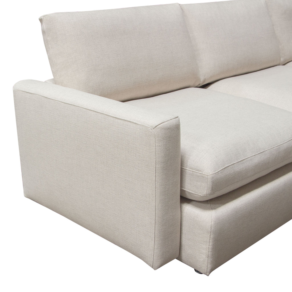 Arcadia 2PC Reversible Chaise Sectional w/ Feather Down Seating in Cream Fabric by Diamond Sofa - styled in a staged room by Center Stage Home Design