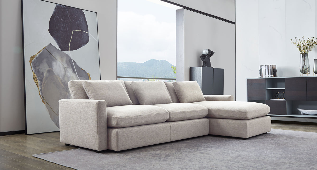 Arcadia 2PC Reversible Chaise Sectional w/ Feather Down Seating in Cream Fabric by Diamond Sofa - styled in a staged room by Center Stage Home Design