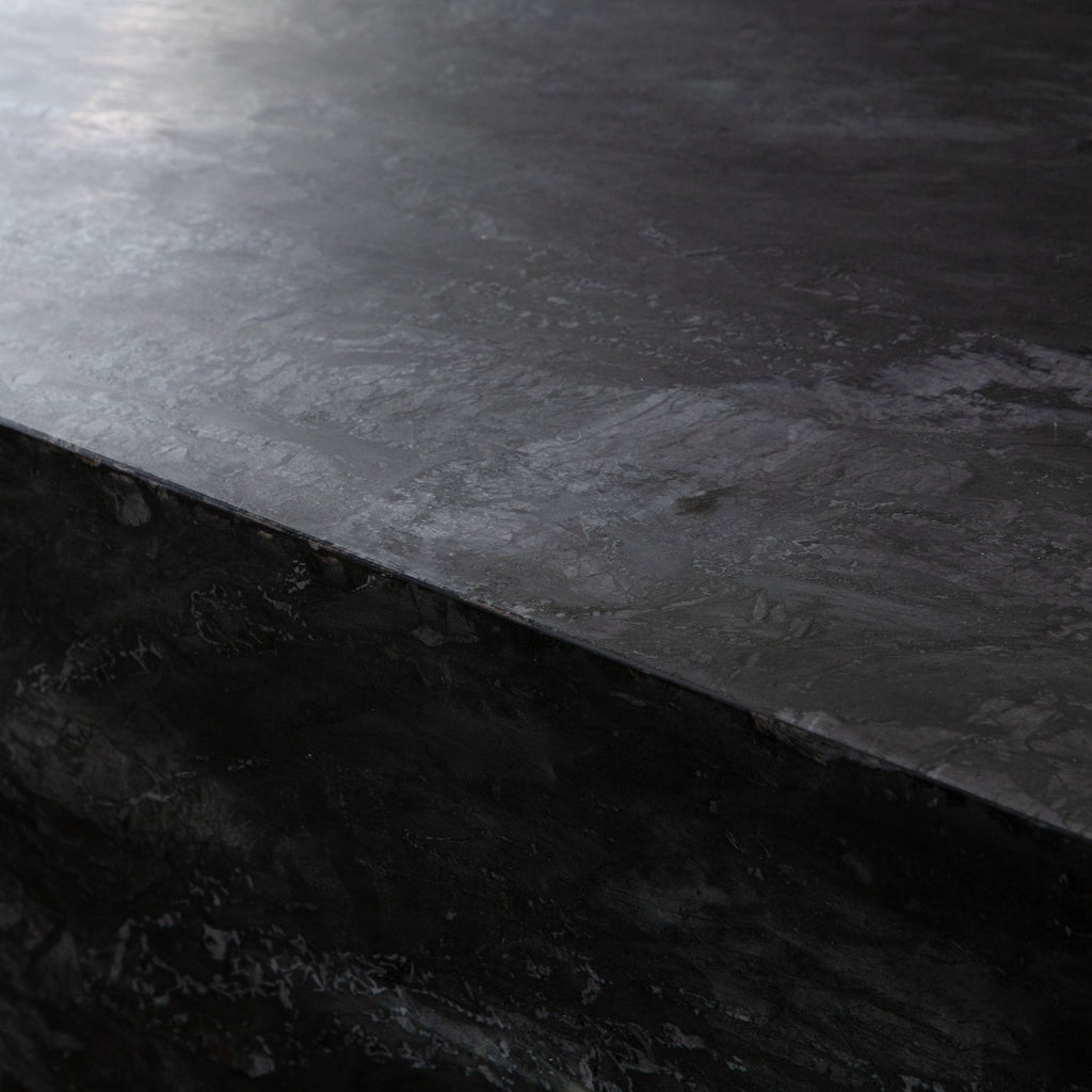 Ark Rectangle Cocktail Table in Genuine Black Marble by Diamond Sofa - styled in a staged room by Center Stage Home Design