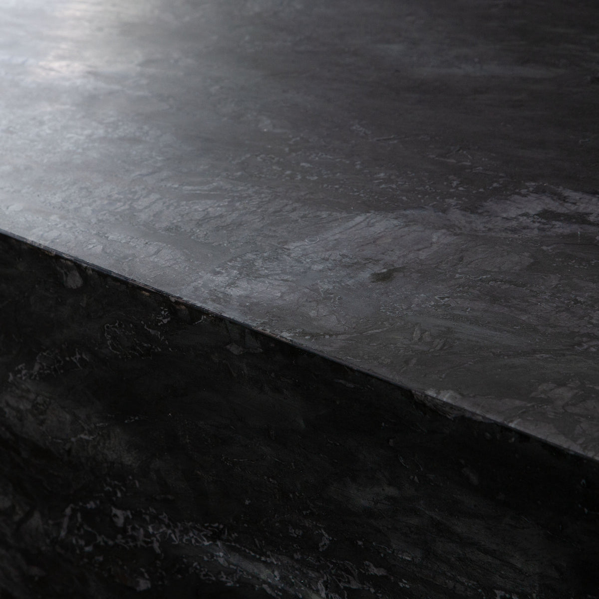 Ark Rectangle Cocktail Table in Genuine Black Marble by Diamond Sofa - styled in a staged room by Center Stage Home Design