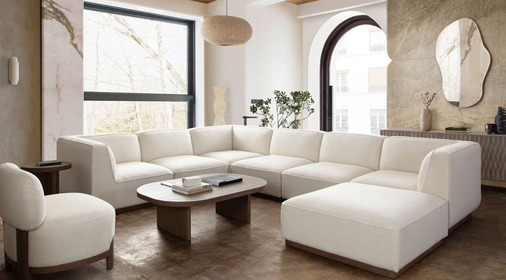 Aspen Armless Chair in Cream Polyester Fabric with Wood Trim by Diamond Sofa - styled in a staged room by Center Stage Home Design