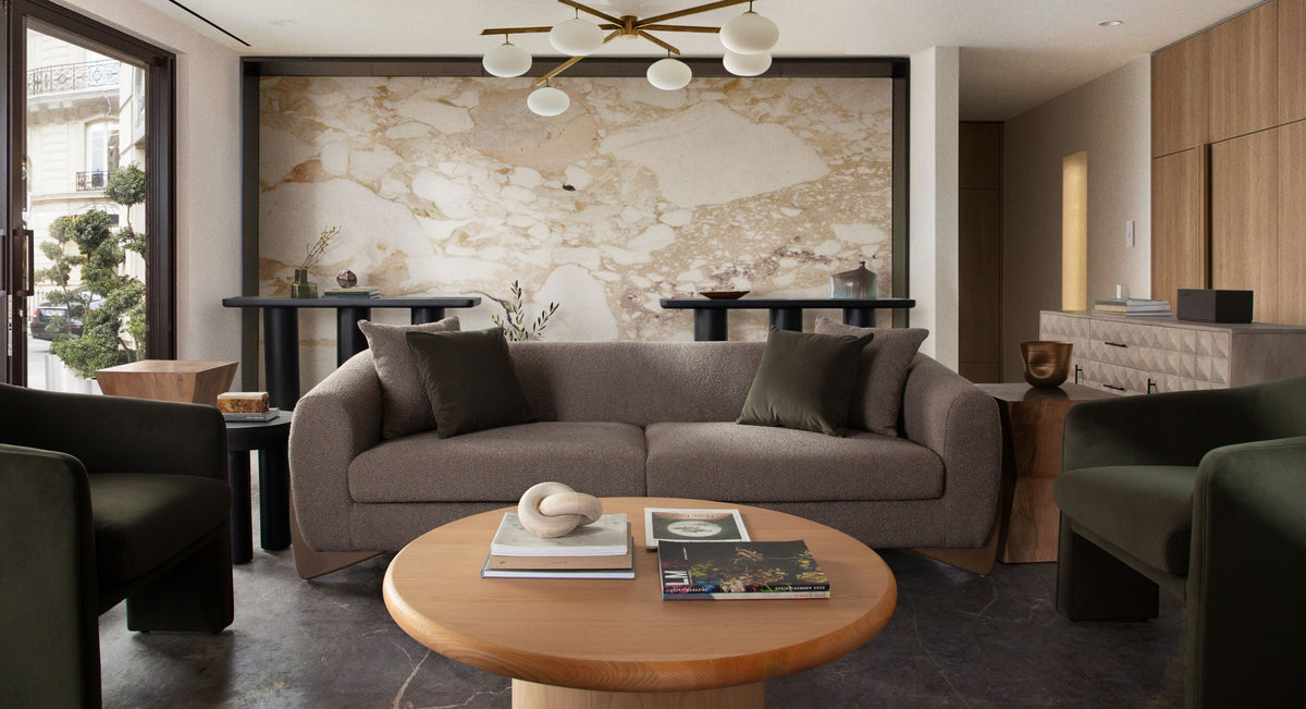 Campbell 40" Round Pedestal Cocktail Table in Light Oak Finish by Diamond Sofa - styled in a staged room by Center Stage Home Design