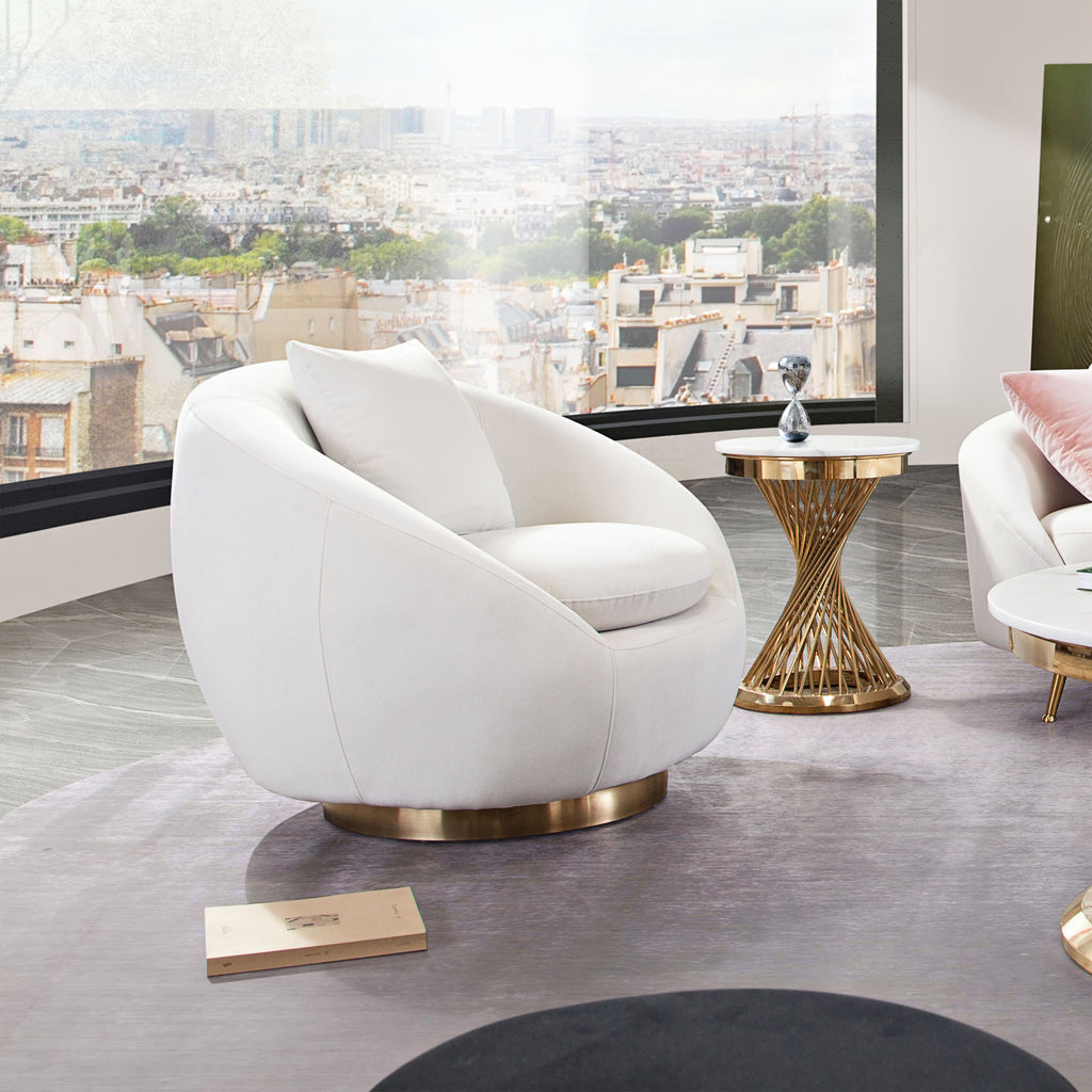 Celine Swivel Accent Chair in Light Cream Velvet w/ Brushed Gold Accent Band by Diamond Sofa - styled in a staged room by Center Stage Home Design