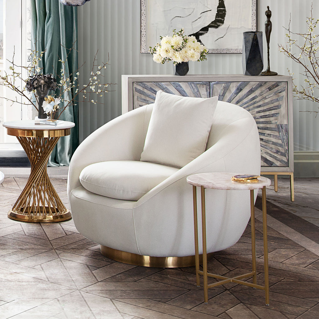 Celine Swivel Accent Chair in Light Cream Velvet w/ Brushed Gold Accent Band by Diamond Sofa - styled in a staged room by Center Stage Home Design