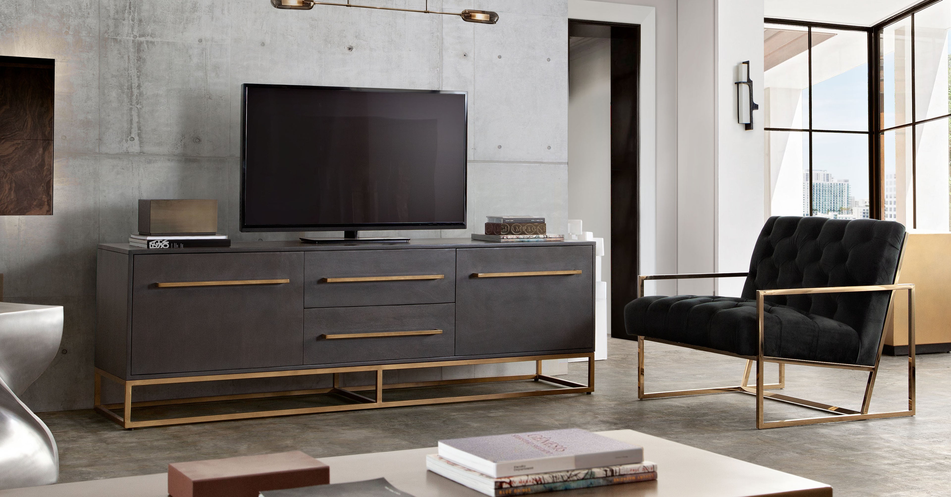 Encore Solid Mango Wood 2-Door / 2-Drawer Entertainment Cabinet in Grey Oak Finish w/ Gold Metal Handle & Base by Diamond Sofa - styled in a staged room by Center Stage Home Design