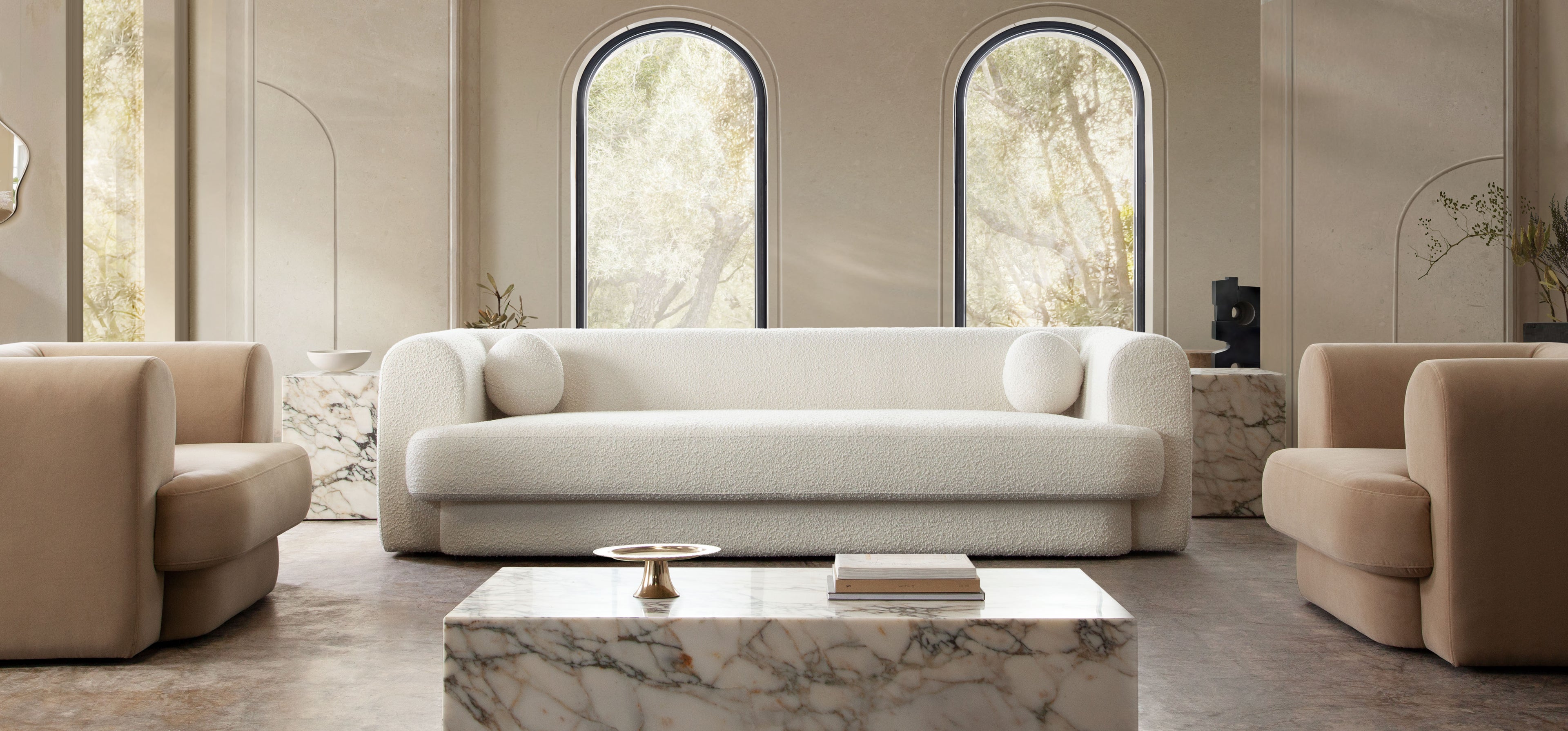 Form Sofa in Ivory Boucle Fabric w/ (2) Accent Pillow Balls by Diamond Sofa - styled in a staged room by Center Stage Home Design