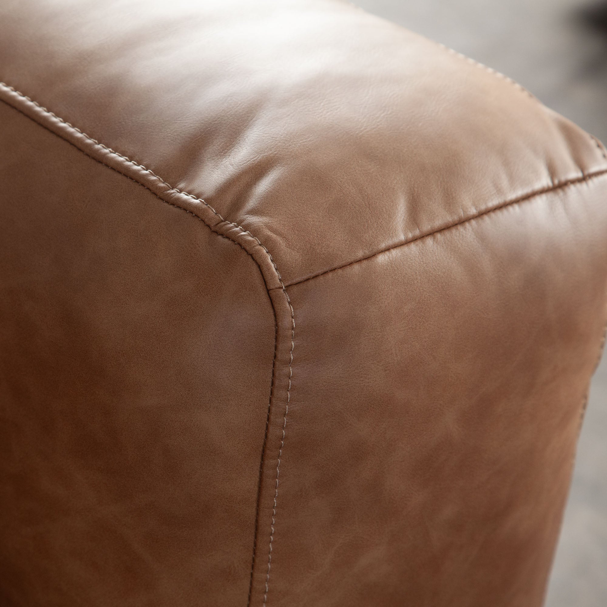Hyde Sofa in Saddle Brown Leatherette by Diamond Sofa - styled in a staged room by Center Stage Home Design