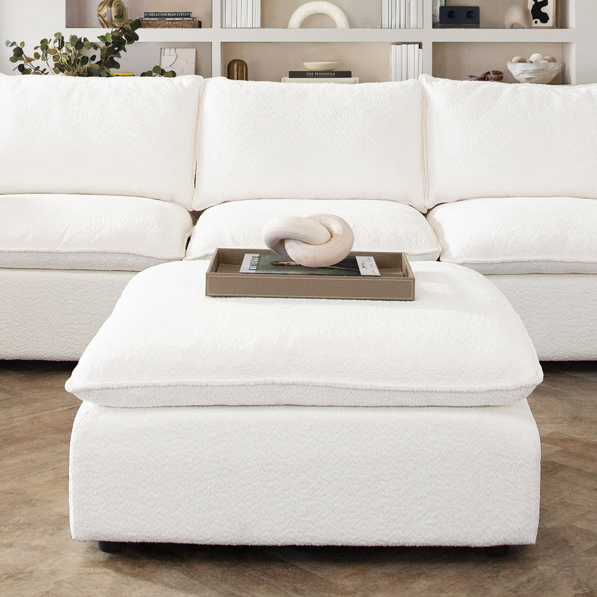 Ivy Square Ottoman in White Faux Shearling w/ Feather Down Seating by Diamond Sofa - styled in a staged room by Center Stage Home Design