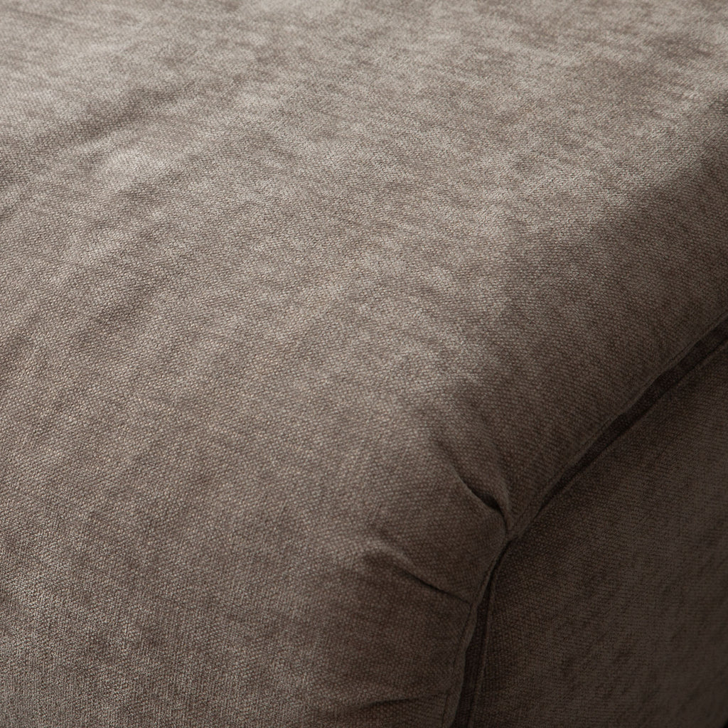 Leigh Armless Chair in Dove Nature Polyester Fabric by Diamond Sofa - styled in a staged room by Center Stage Home Design