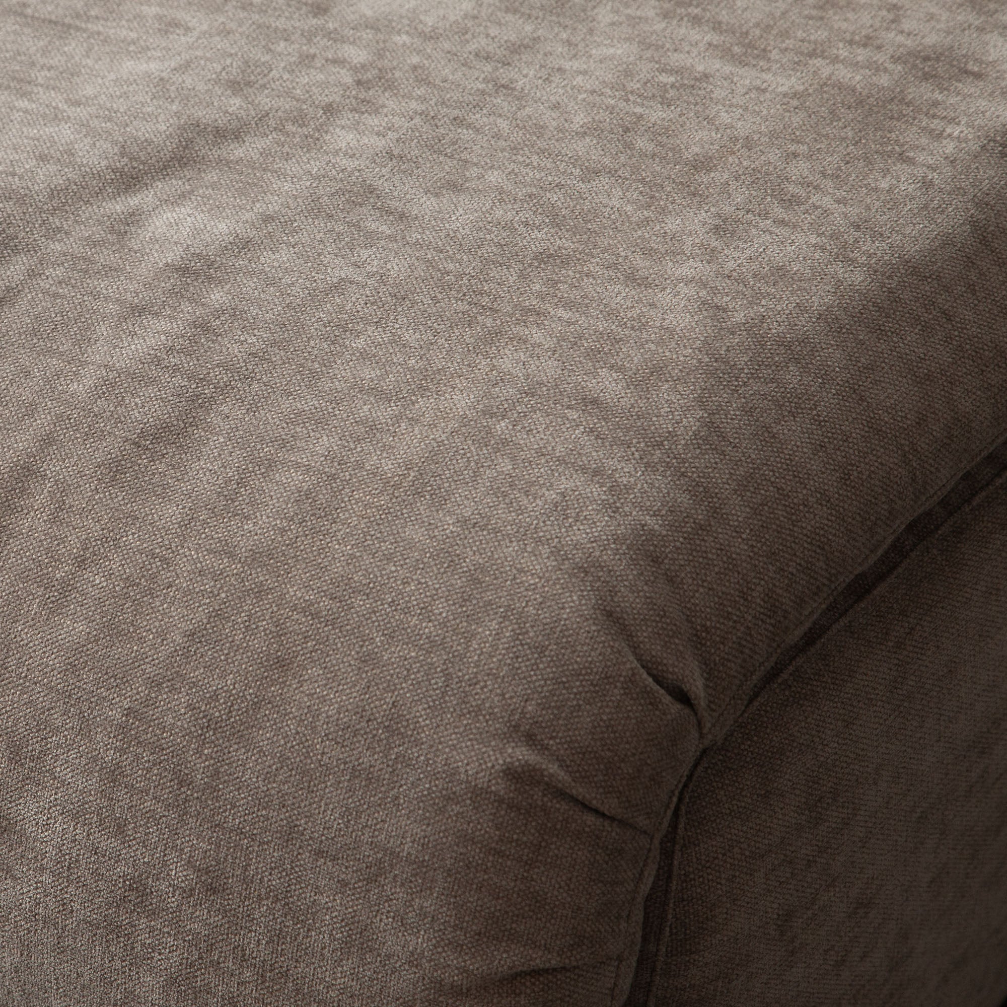 Leigh Armless Chair in Dove Nature Polyester Fabric by Diamond Sofa - styled in a staged room by Center Stage Home Design