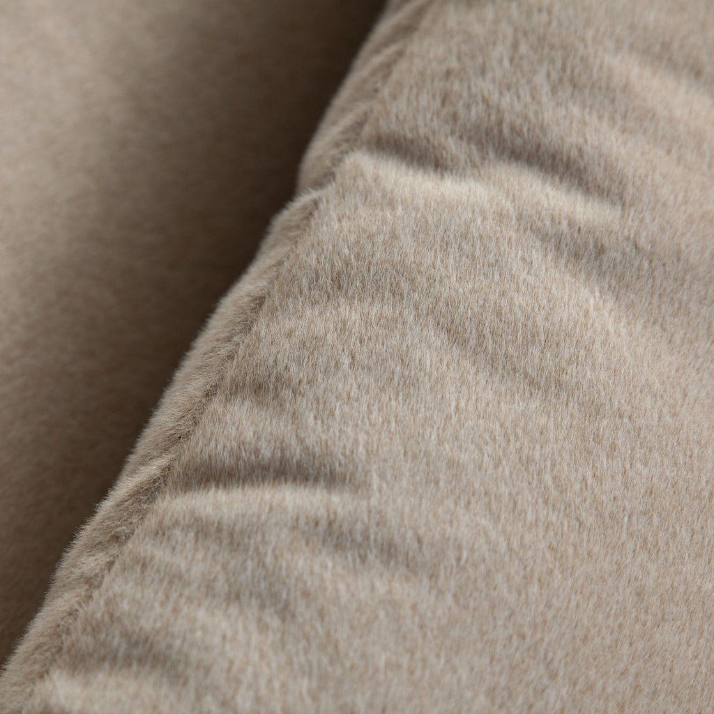 Lena Swivel Accent Chair in Fawn Faux Alpaca Fabric by Diamond Sofa - styled in a staged room by Center Stage Home Design