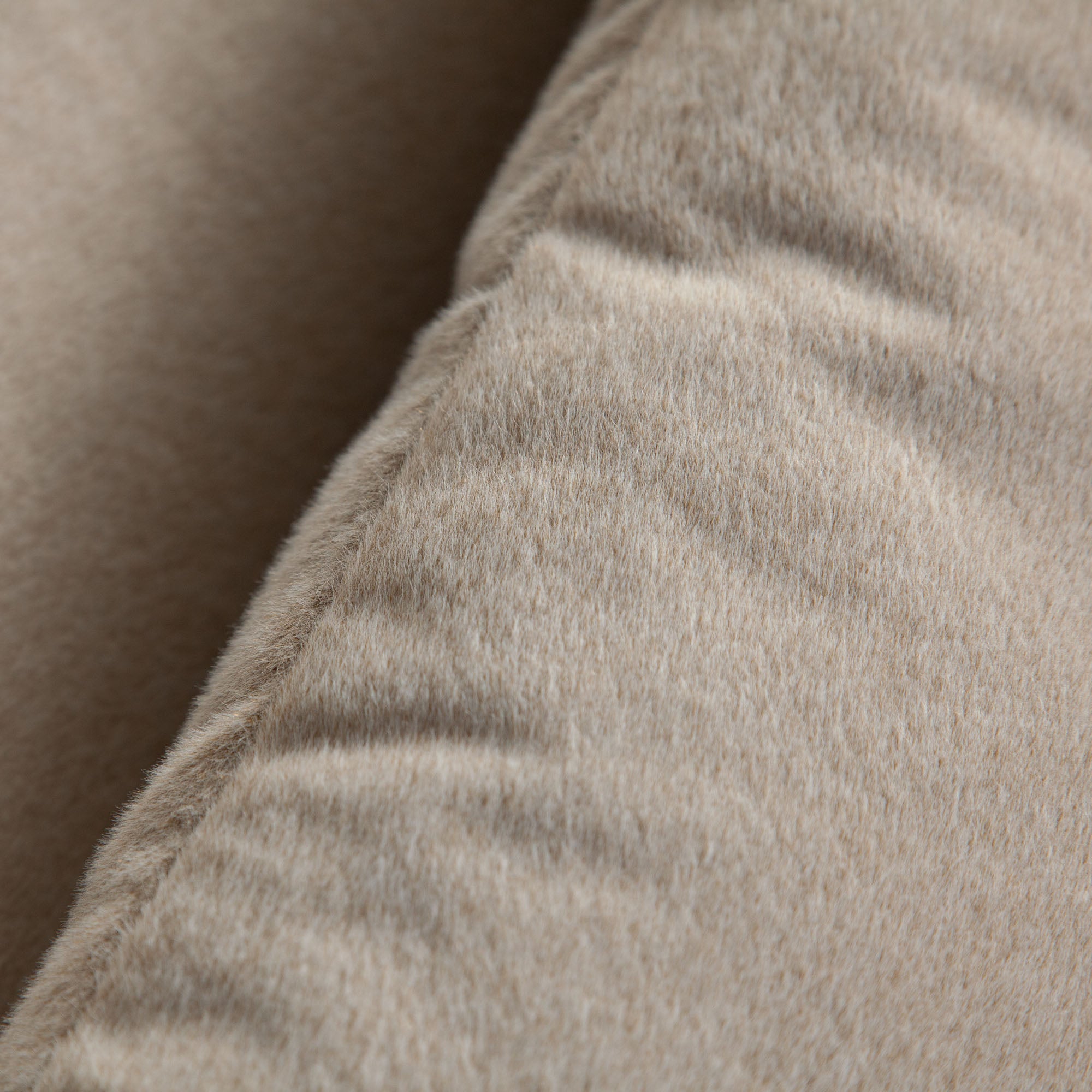 Lena Swivel Accent Chair in Fawn Faux Alpaca Fabric by Diamond Sofa - styled in a staged room by Center Stage Home Design