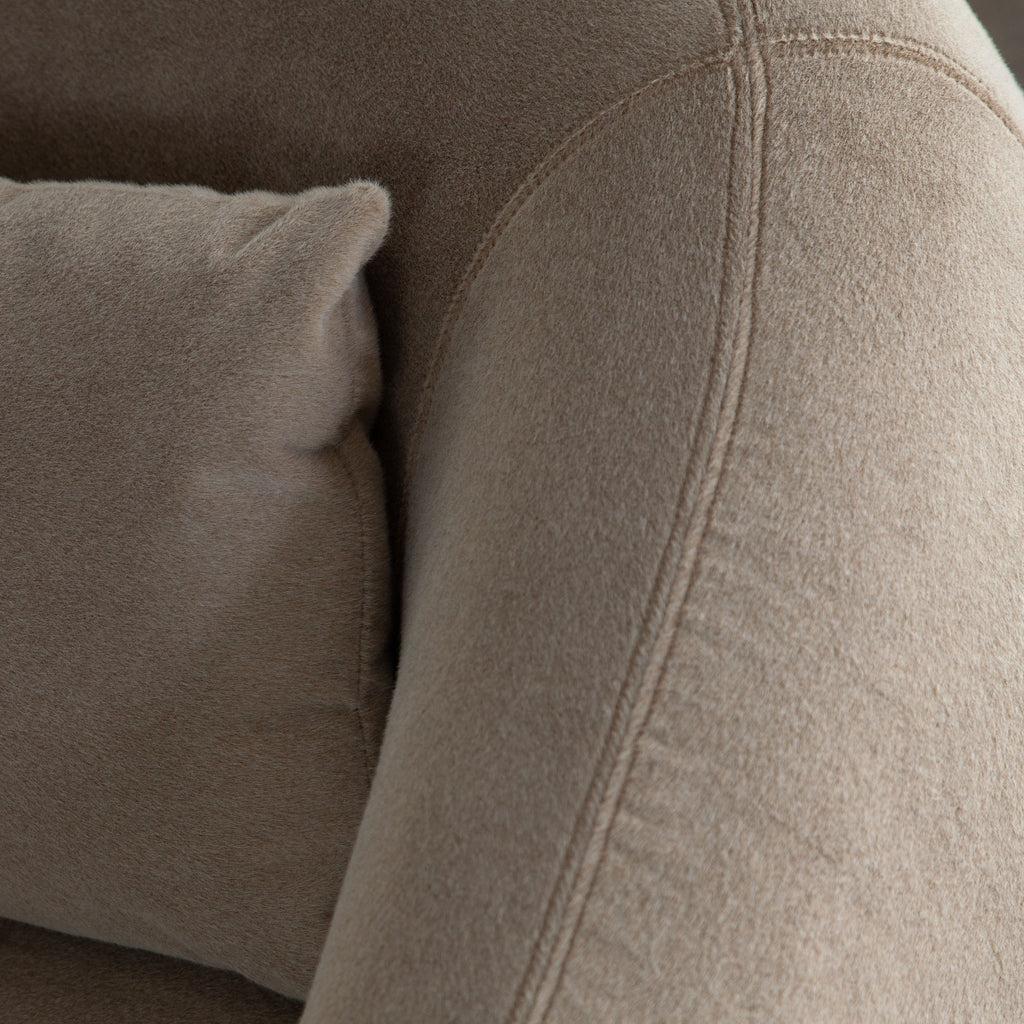 Lena Swivel Accent Chair in Fawn Faux Alpaca Fabric by Diamond Sofa - styled in a staged room by Center Stage Home Design