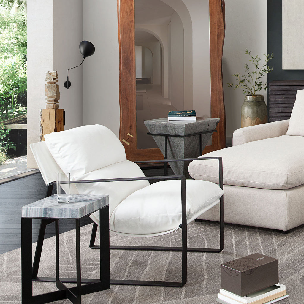 Miller Sling Accent Chair in White Linen Fabric w/ Black Powder Coated Metal Frame by Diamond Sofa - styled in a staged room by Center Stage Home Design
