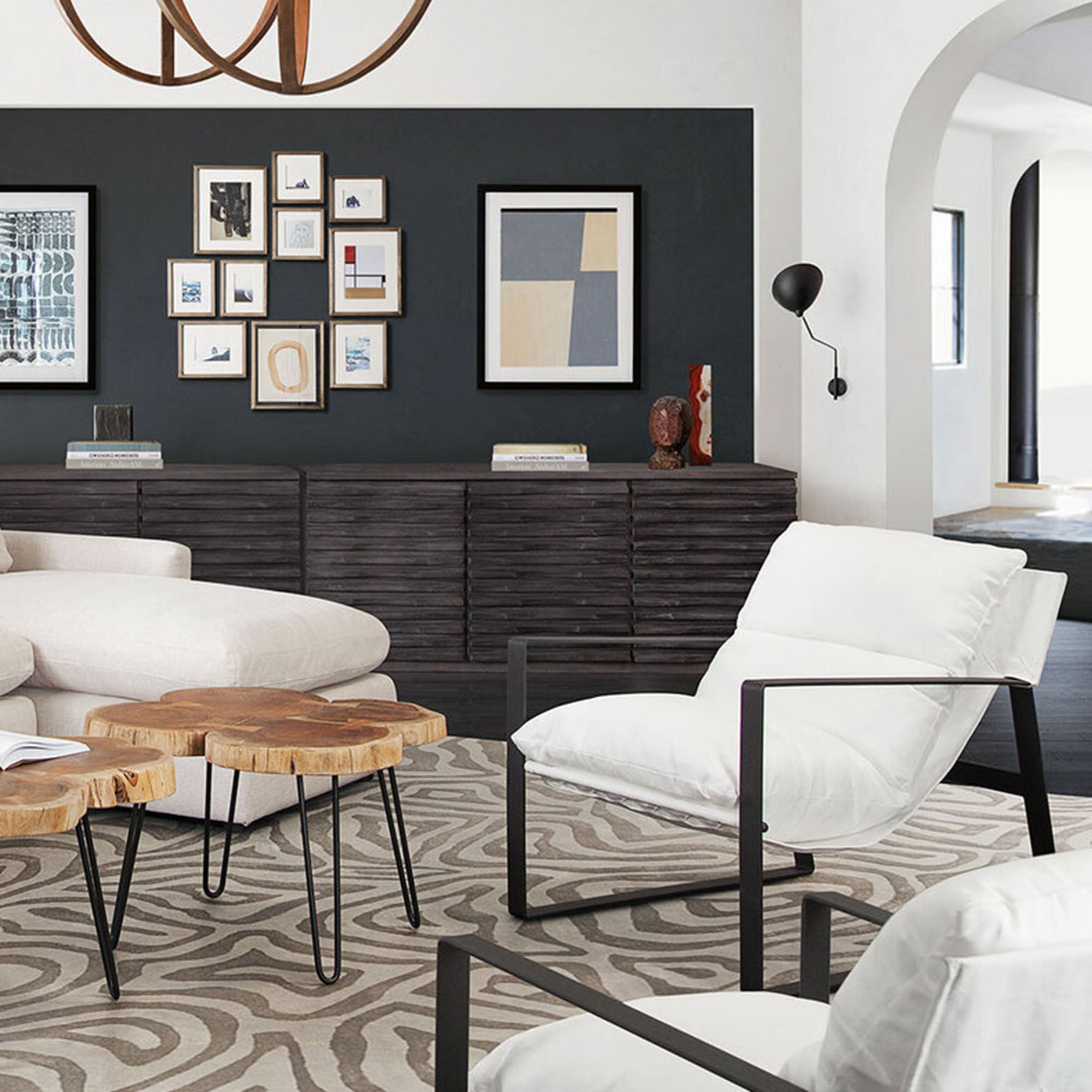 Miller Sling Accent Chair in White Linen Fabric w/ Black Powder Coated Metal Frame by Diamond Sofa - styled in a staged room by Center Stage Home Design