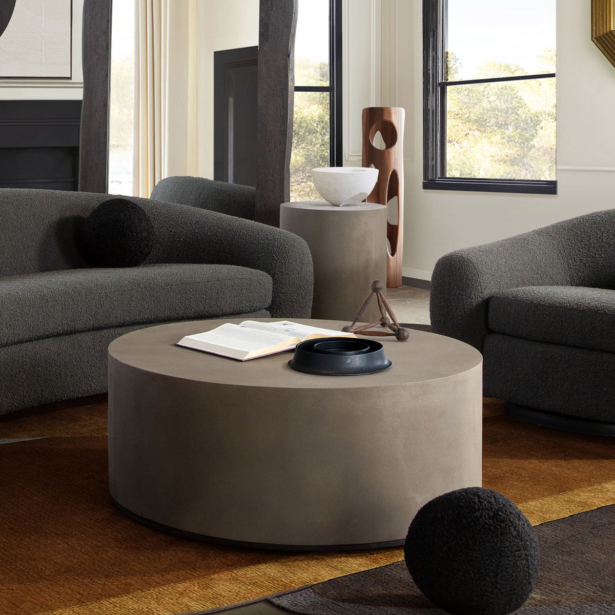 Montage Round Natural Cement Grey Cocktail Table by Diamond Sofa - styled in a staged room by Center Stage Home Design