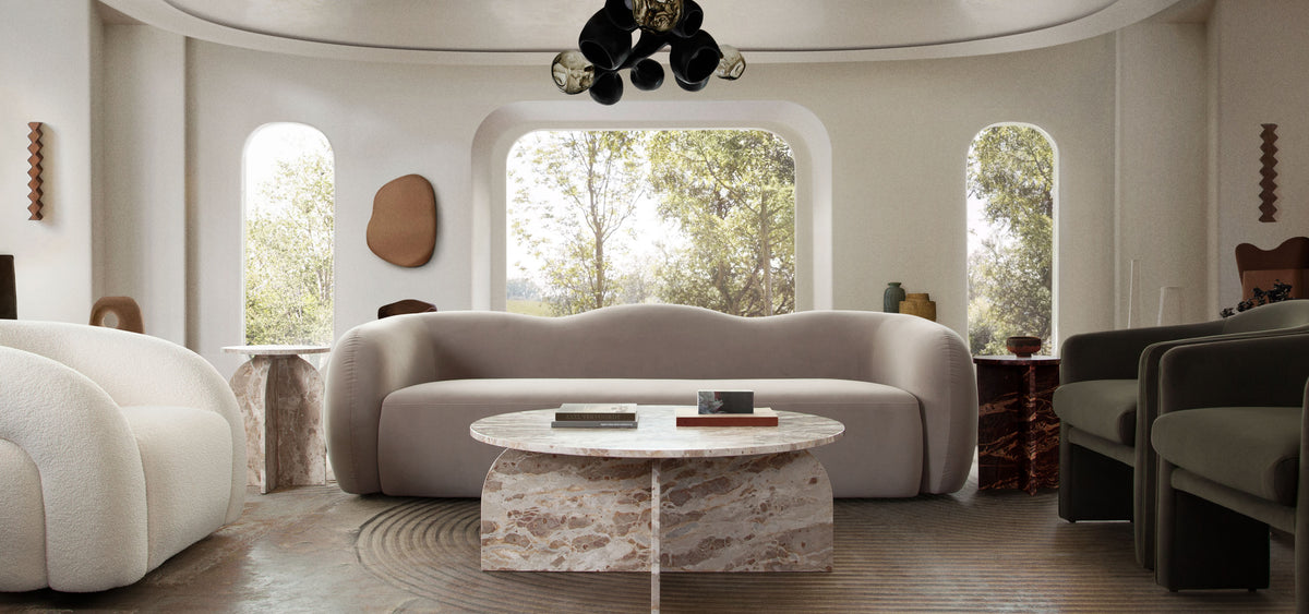 Nebula Round End Table in Genuine Marble Panther Beige finish by Diamond Sofa - styled in a staged room by Center Stage Home Design