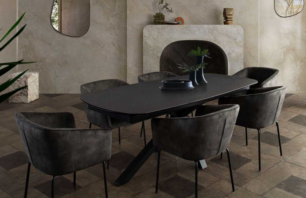 Onyx Rectangle Extension Dining Table w/ Black Ceramic Glass Top & Black Metal Leg by Diamond Sofa - styled in a staged room by Center Stage Home Design