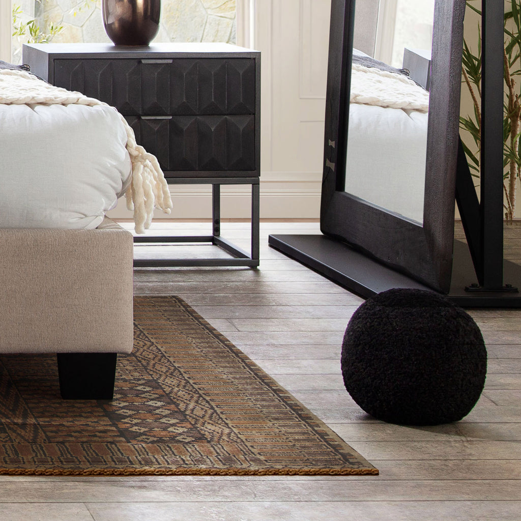 Set of (2) 10" Round Accent Pillows in Black Faux Sheepskin by Diamond Sofa - styled in a staged room by Center Stage Home Design