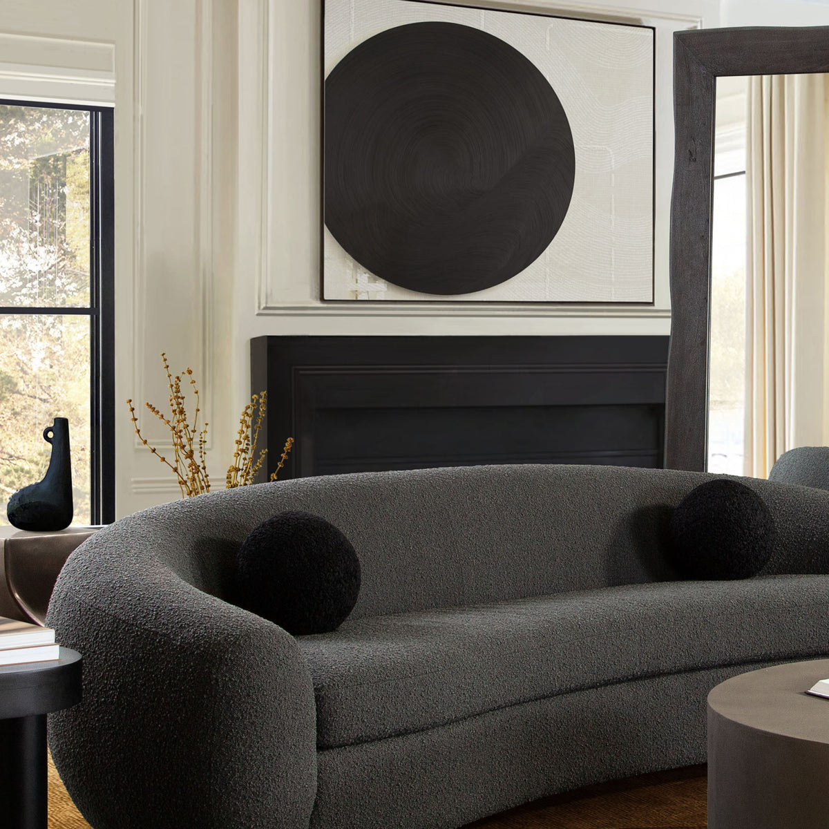Set of (2) 10" Round Accent Pillows in Black Faux Sheepskin by Diamond Sofa - styled in a staged room by Center Stage Home Design