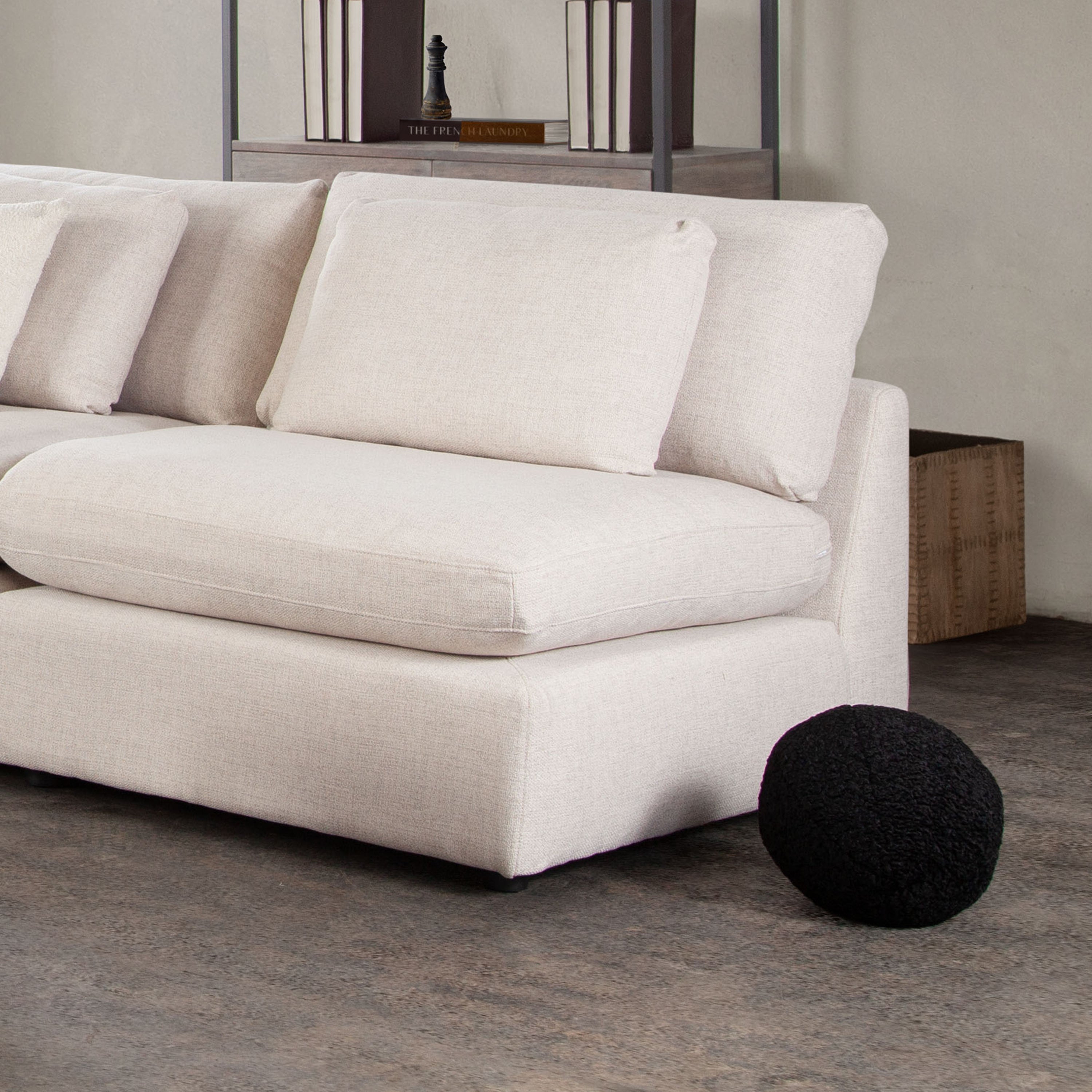 Set of (2) 10" Round Accent Pillows in Black Faux Sheepskin by Diamond Sofa - styled in a staged room by Center Stage Home Design