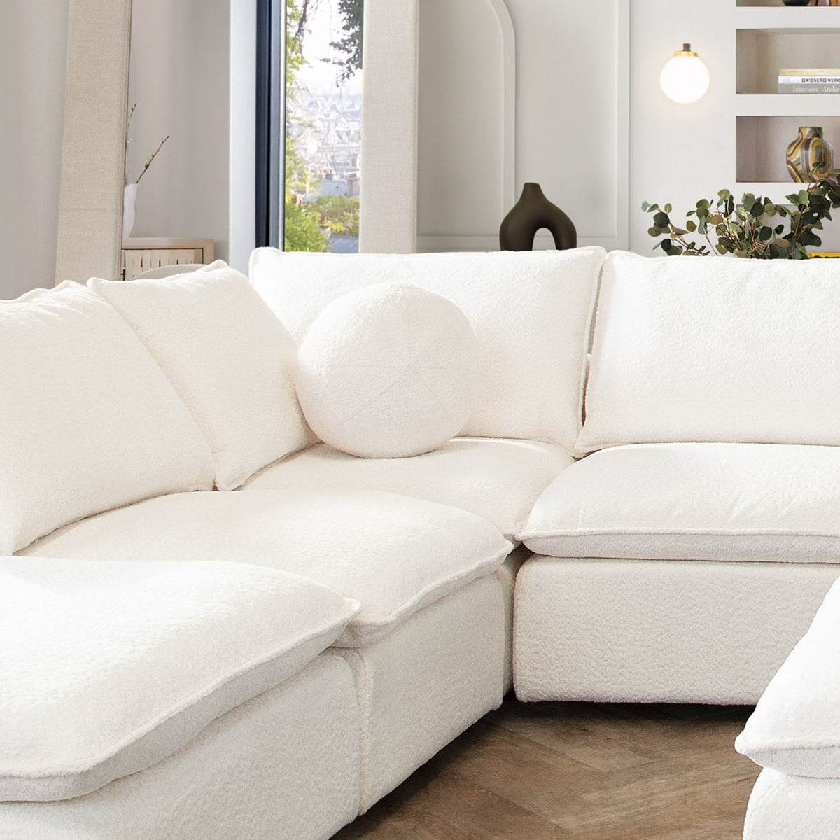 Single 14" Round Accent Pillow Ball in White Faux Shearling by Diamond Sofa - styled in a staged room by Center Stage Home Design