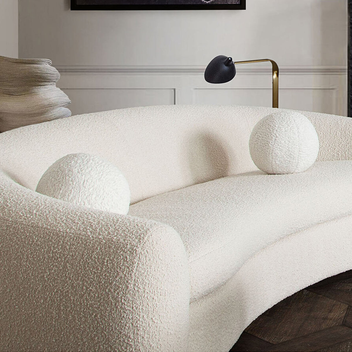 Set of (2) 10" Round Accent Pillows in White Faux Sheepskin by Diamond Sofa - styled in a staged room by Center Stage Home Design