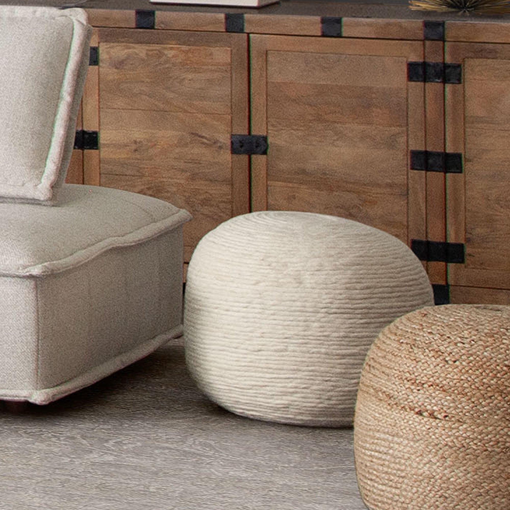 Round Pouf in White Dyed Natural Wool by Diamond Sofa - styled in a staged room by Center Stage Home Design