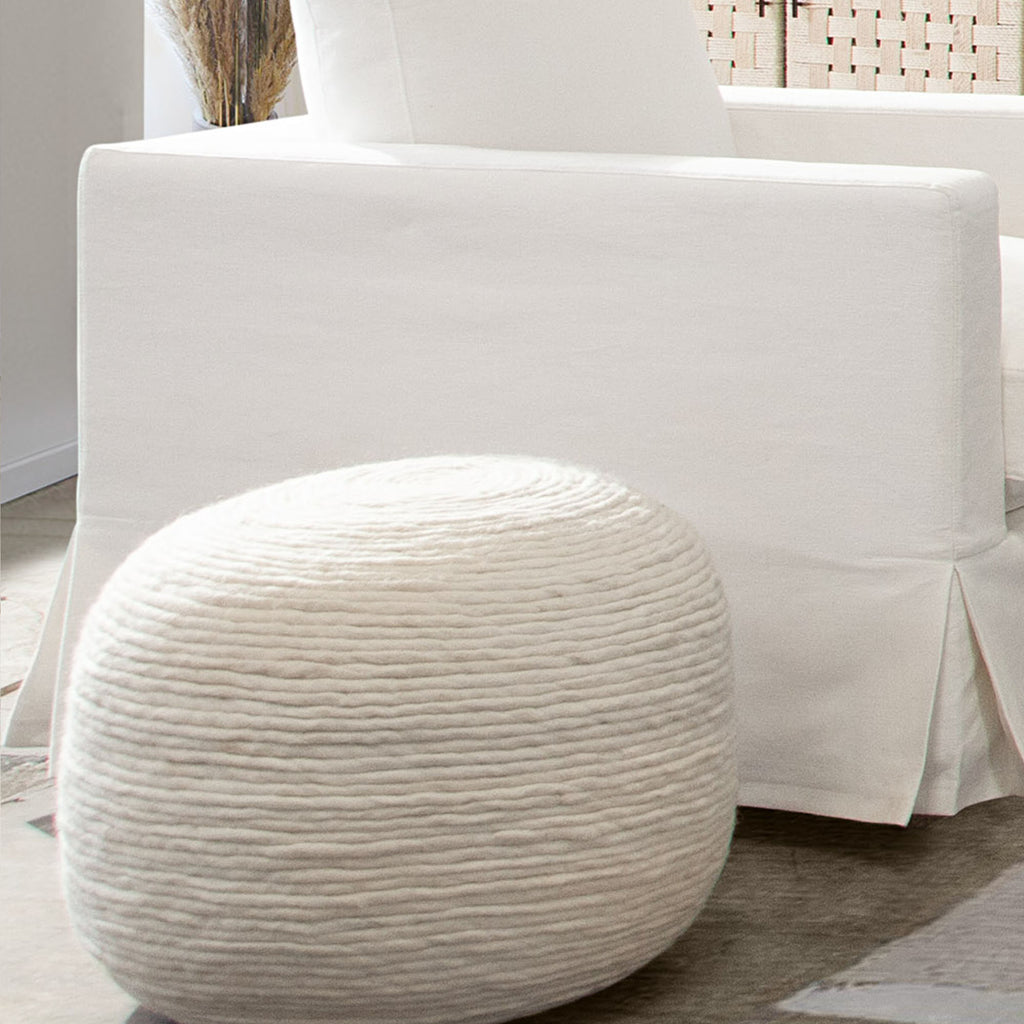 Round Pouf in White Dyed Natural Wool by Diamond Sofa - styled in a staged room by Center Stage Home Design