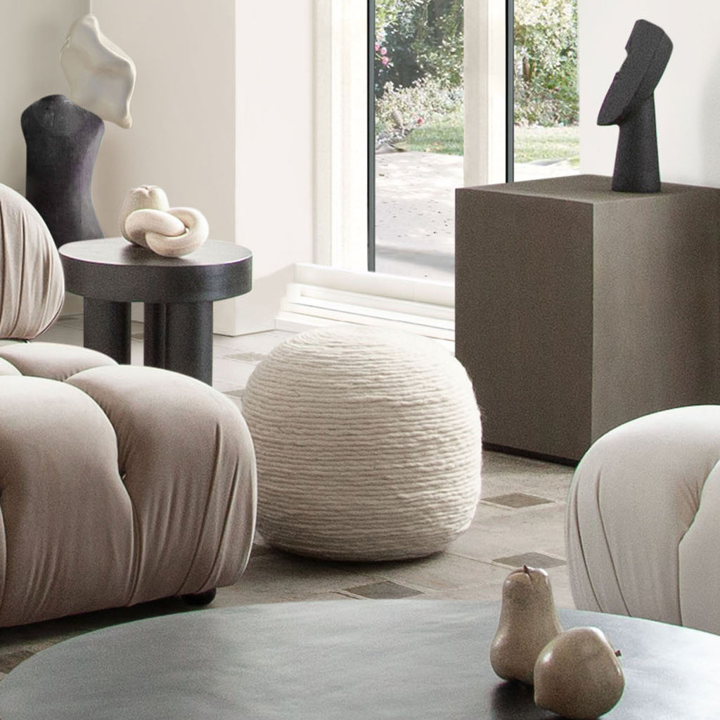 Round Pouf in White Dyed Natural Wool by Diamond Sofa - styled in a staged room by Center Stage Home Design