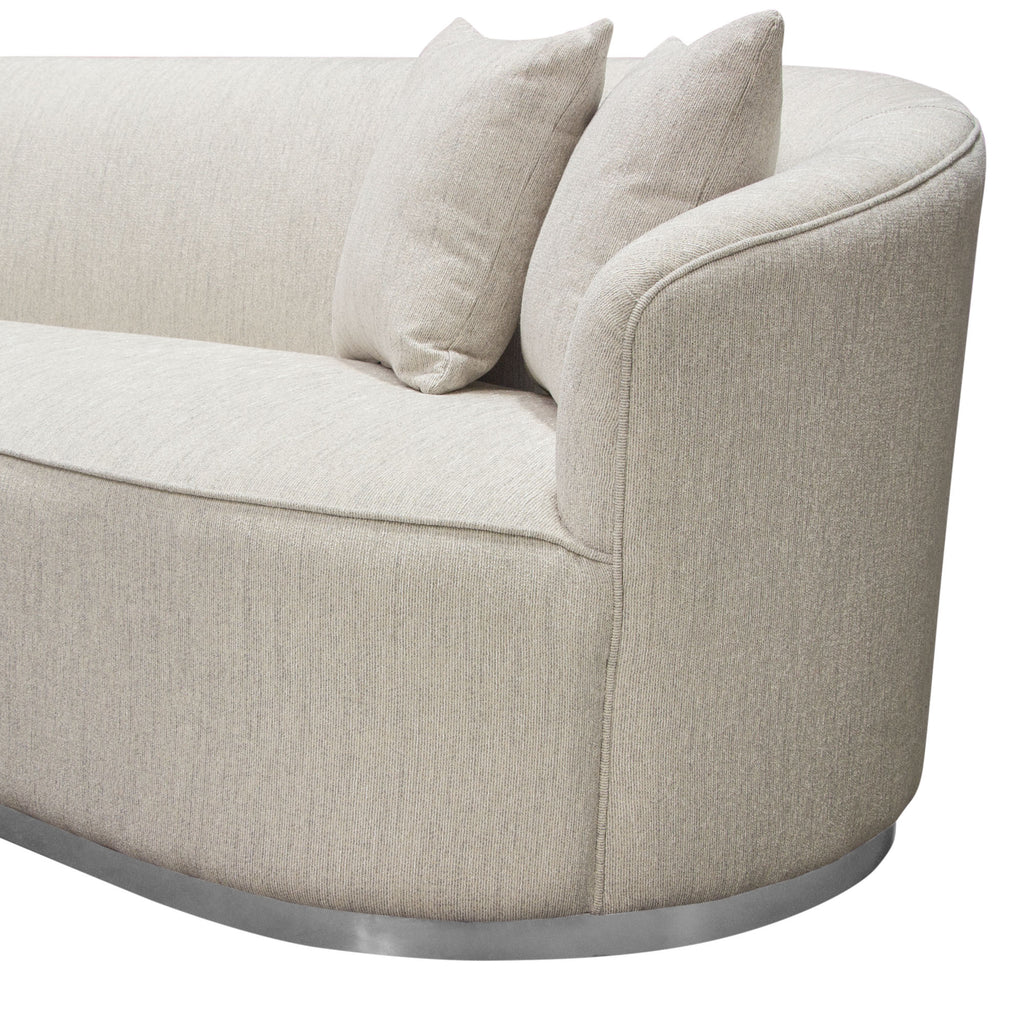 Raven Sofa in Light Cream Fabric w/ Brushed Silver Accent Trim by Diamond Sofa - styled in a staged room by Center Stage Home Design