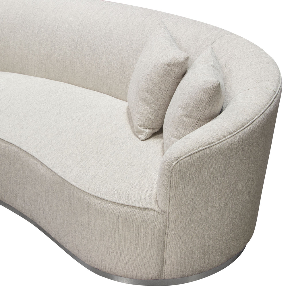 Raven Sofa in Light Cream Fabric w/ Brushed Silver Accent Trim by Diamond Sofa - styled in a staged room by Center Stage Home Design