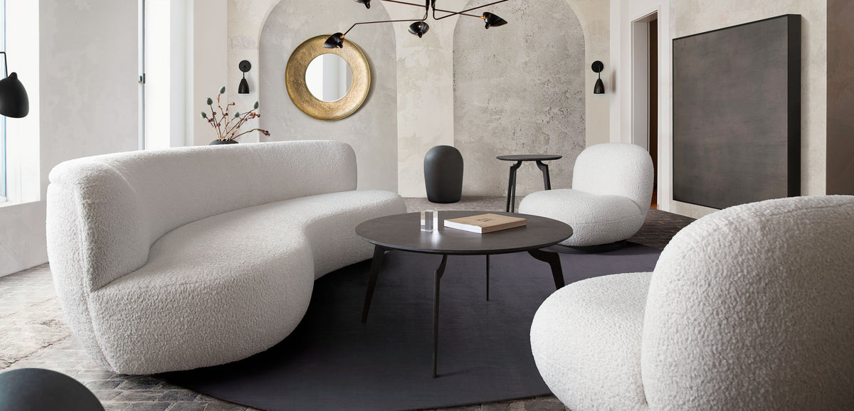 Simone Swivel Accent Chair in White Faux Sheepskin Fabric by Diamond Sofa - styled in a staged room by Center Stage Home Design