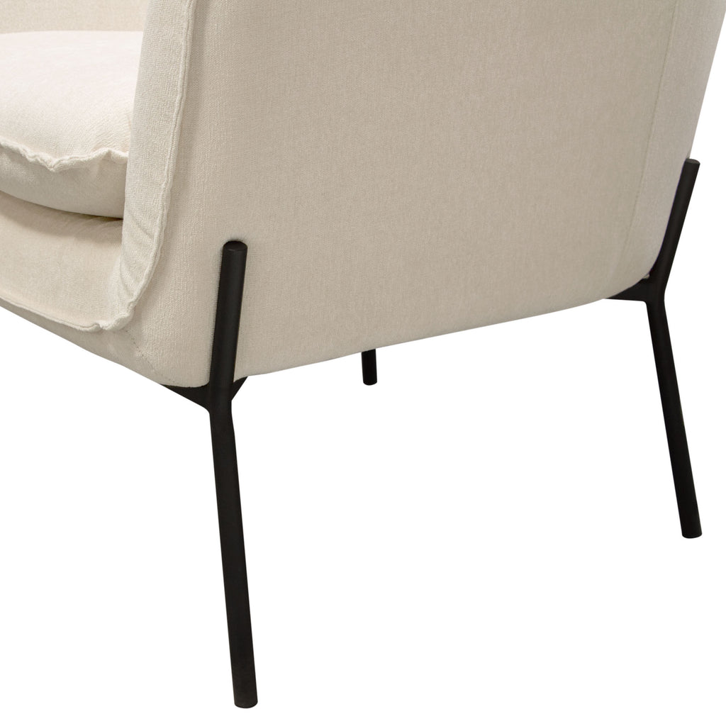 Status Accent Chair in Cream Fabric with Black Powder Coated Metal Leg by Diamond Sofa - styled in a staged room by Center Stage Home Design