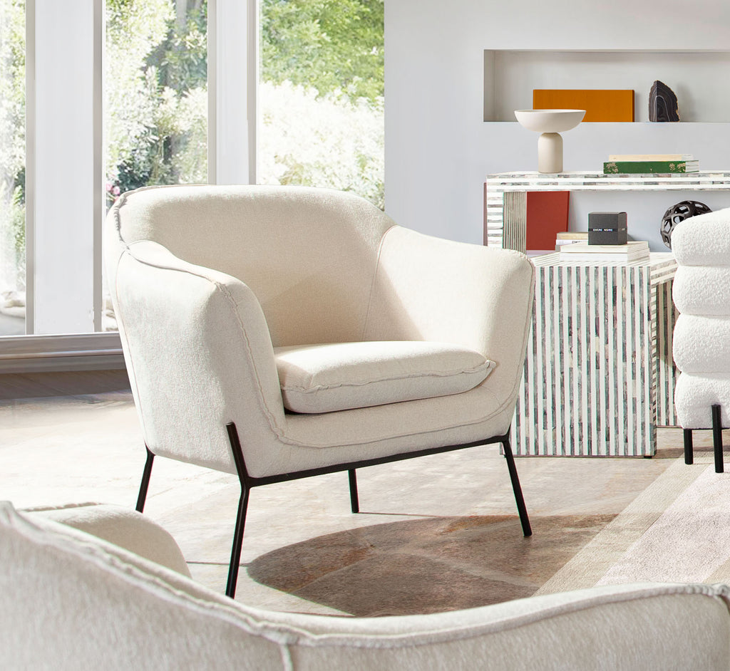 Status Accent Chair in Cream Fabric with Black Powder Coated Metal Leg by Diamond Sofa - styled in a staged room by Center Stage Home Design