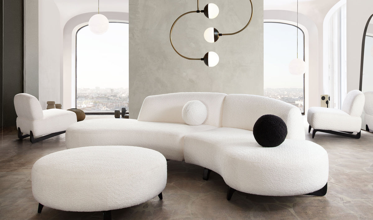 Vesper 2PC Modular Curved Armless Chaise in Faux White Shearling w/ Black Wood Leg Base by Diamond Sofa - styled in a staged room by Center Stage Home Design