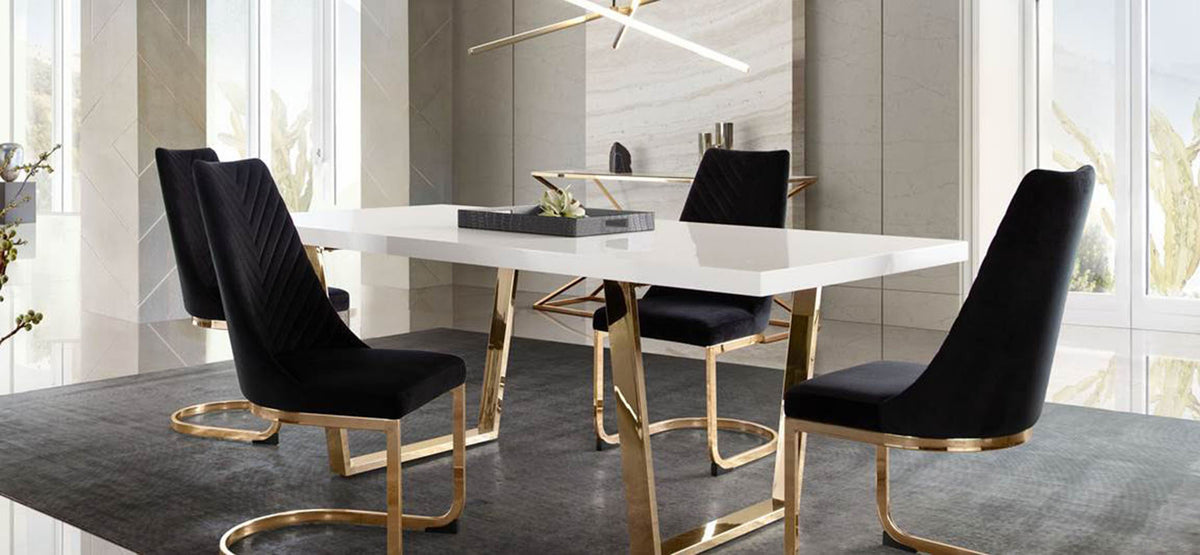 Vogue Set of (2) Dining Chairs in Black Velvet with Polished Gold Metal Base by Diamond Sofa - styled in a staged room by Center Stage Home Design
