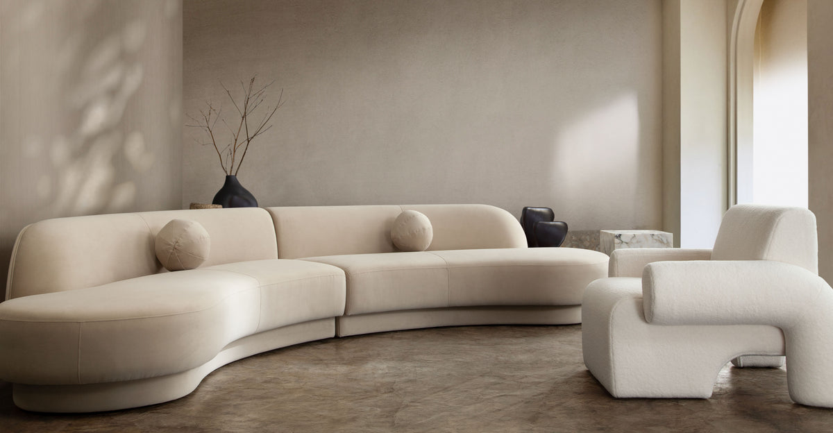 Zelda 2PC Modular Curved Armless Chaise in Light Camel Performance Velvet w/ (2) Accent Pillow Balls by Diamond Sofa - styled in a staged room by Center Stage Home Design