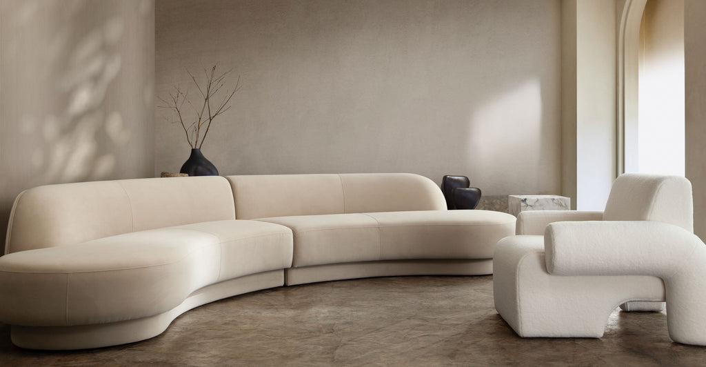 Zelda 2PC Modular Curved Armless Chaise in Light Camel Performance Velvet w/ (2) Accent Pillow Balls by Diamond Sofa - styled in a staged room by Center Stage Home Design